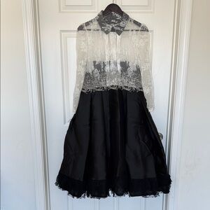 Elegant Black and White Lace Dress in good condition